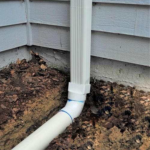 Klaus Larsen LLC installs gutter downspout extensions in Bloomfield, Granby, New London